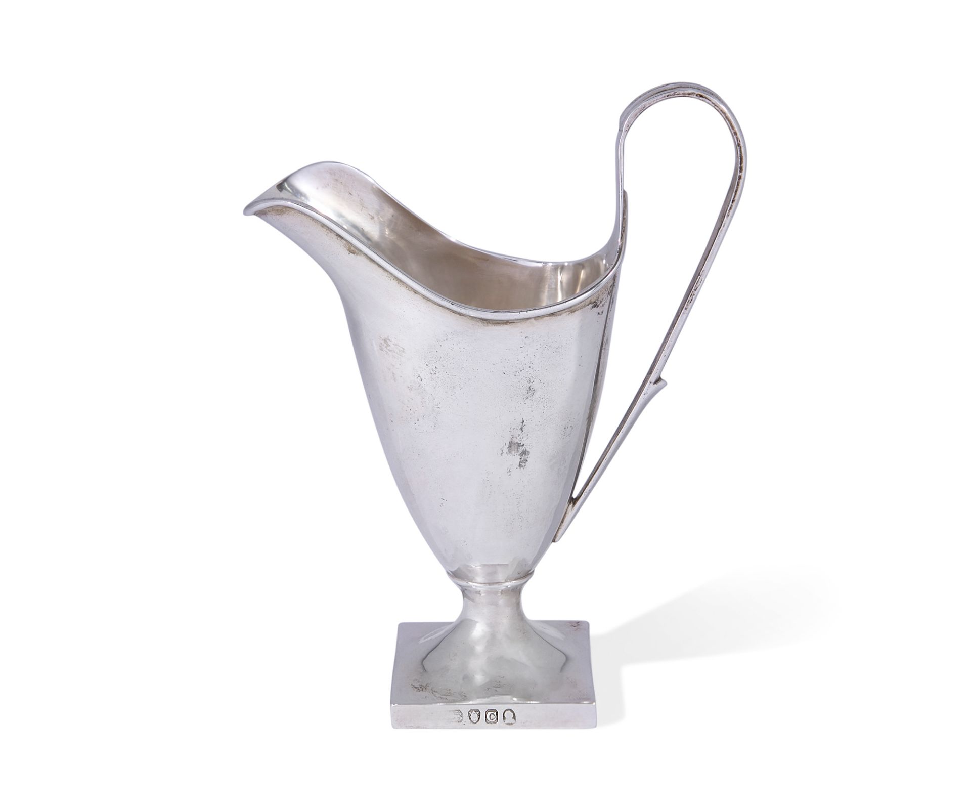 A George III silver helmet-shaped cream jug, London, 1798, no maker's mark visible, the helmet-sh...