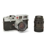 A Leica M6 35mm rangefinder camera, 1992, chrome, serial no. 1931932, held in original packaging,...