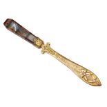 A Scottish gilt-brass and agate paper knife, attributed to Hamilton, Crichton & Co. of Edinburgh,...