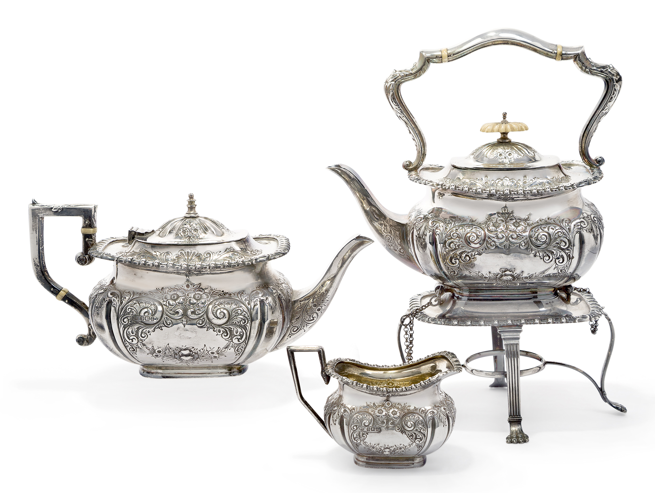 A matched silver tea kettle, teapot and milk jug, the teapot and jug Sheffield, 1899, John Gallim...