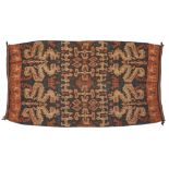 A cotton textile, Indonesia, 20th century, of rectangular form, woven in blue, red, brown and cre...