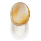 A single stone citrine ring, an oval cabochon citrine, approximately 28 x 20mm, collet set to a t...
