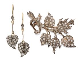 A Victorian diamond-set brooch and earrings, the floral and foliate spray brooch, possibly rosehi...