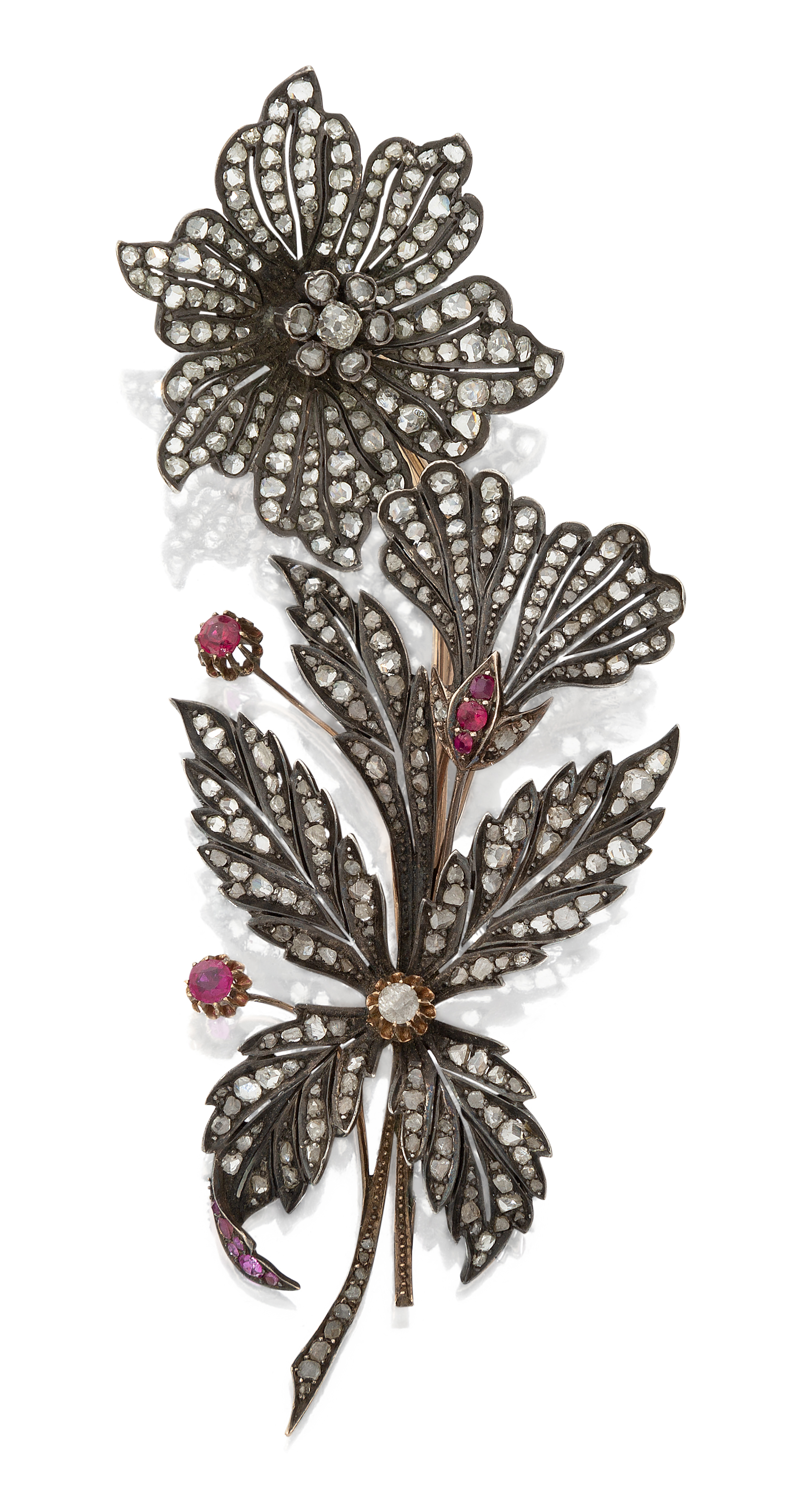 A late 19th century diamond and ruby spray brooch, with an old-cut and rose-cut diamond set flowe...