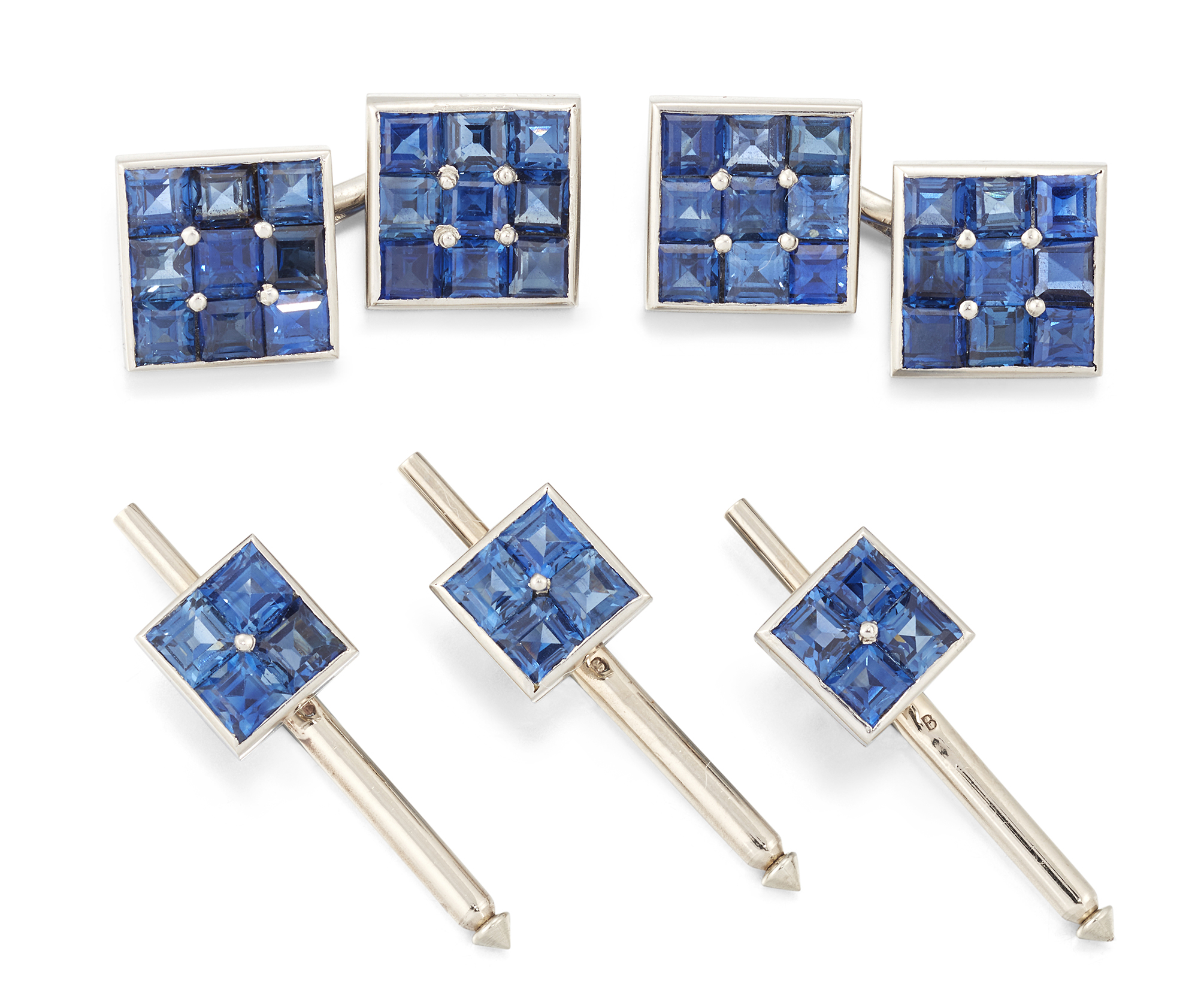 Shreeve Crump & Low. An Art Deco platinum and sapphire dress set, comprising: a pair of calibré s...