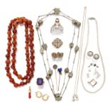 A group of jewellery, including: a rock crystal swivel seal fob, one face intaglio engraved with ...