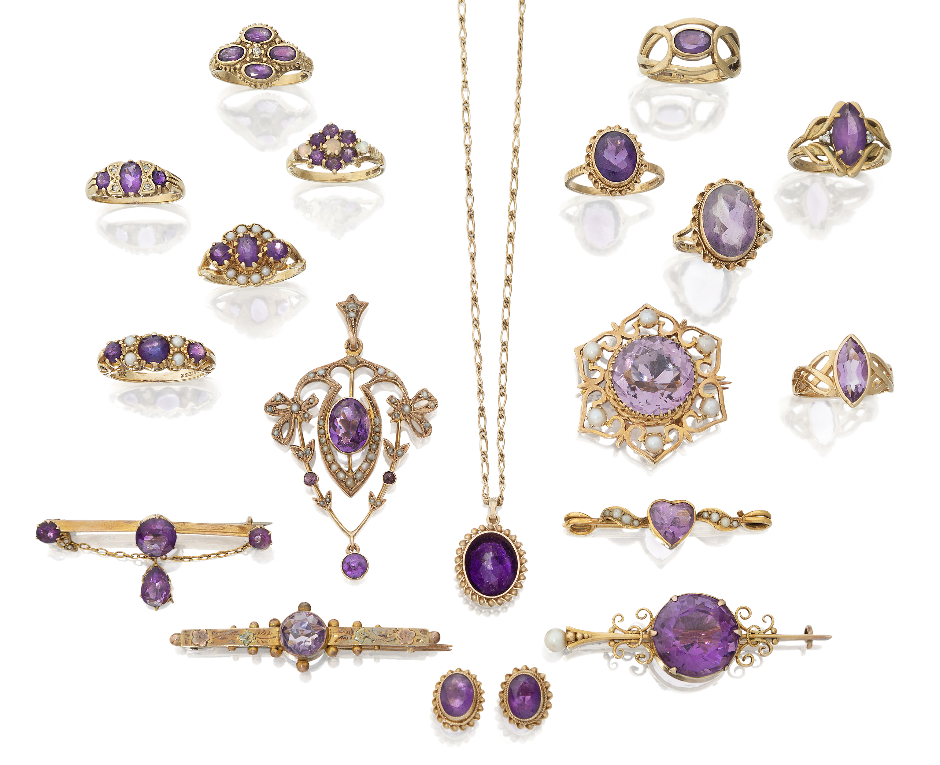 A group of amethyst jewellery, comprising: ten 9ct gold amethyst rings, several with seed pearl, ...