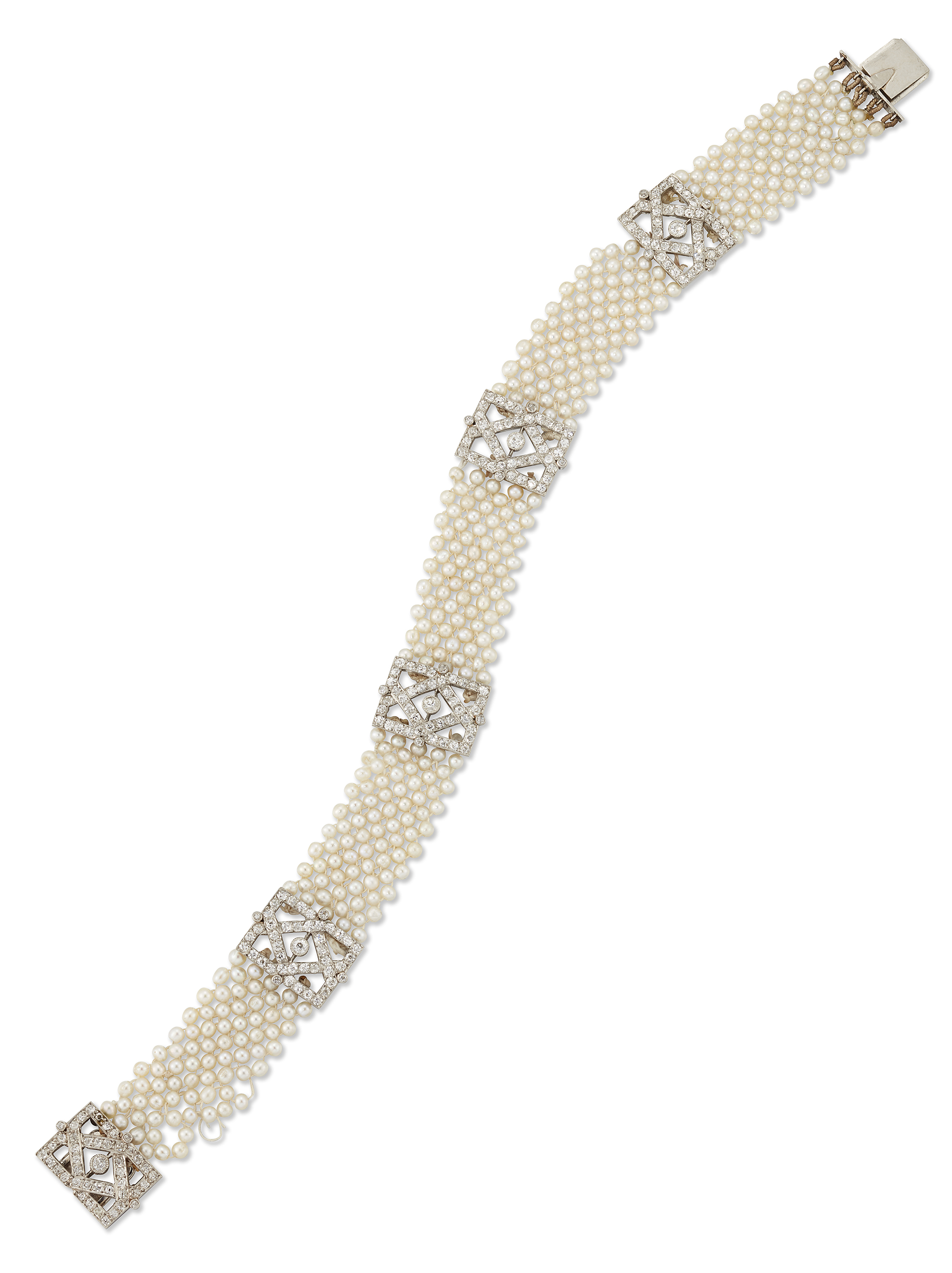 A Belle Époque diamond and seed pearl bracelet, the seed pearls strung on silk thread and arrange...