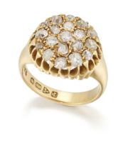 An 18ct gold diamond cluster ring, the circular head pavé set with mixed old-cut diamonds, to tap...
