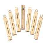 A group of six 18ct gold and one 9ct gold mounted extending pencils, each of oval tubular design ...