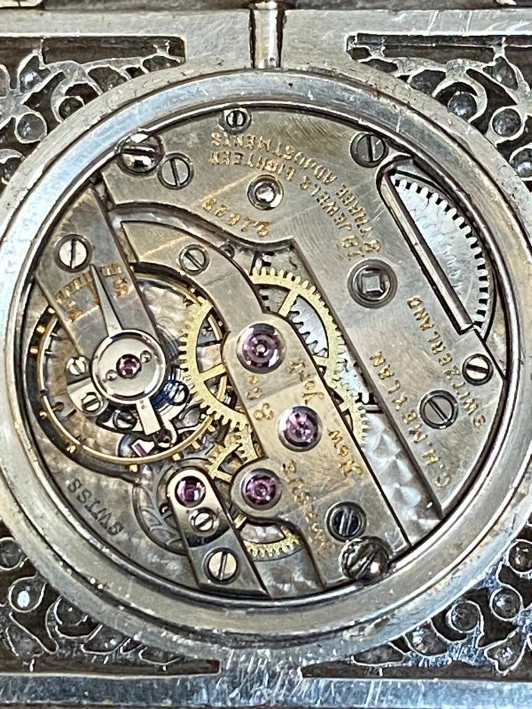 Marcus & Co, C.H. Meylan. An American, Belle Époque, platinum and diamond lapel watch Circa 1910 ... - Image 2 of 6
