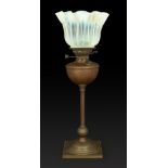 W.A.S. Benson and James Powell and Sons  Table lamp with oil reservoir on column support and vas...