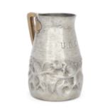 Liberty & Co  Tudric jug modelled as fish amongst waves, engraved 'U.D.C.', circa 1905  Pewter, ...