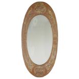 Manner of Margaret Gilmore  Glasgow school oval mirror with celtic knot design, circa 1910  Copp...