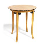 Attributed to Josef Hoffmann  Side table, circa 1910  Beech, ebonised wood  54.5cm high, 48cm di...