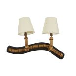 Manner of Jacques Adnet  Two light wall light, late 20th Century  Bamboo, ebonised wood, fabric ...