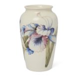 Moorcroft  Orchid pattern vase in pink, blue and green on creamy white ground, 1930s  Glazed ear...