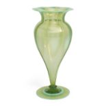Manner of James Powell and Sons  Large uranium opaline glass footed vase with flared wavy rim, c...