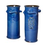 C.H. Brannum Ltd for Liberty & Co., in the manner of Archibald Knox  Two blue vases, one decorat...