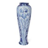 William Moorcroft (1872-1945) for MacIntyre & Co  Large Blue and White Florian iris vase, circa ...