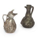 Jean Garnier (1853-1910)  Novelty jugs, one depicting a baby bird, and another depicting a water...