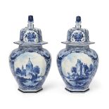 A pair of Dutch Delft blue and white vases and covers, last quarter 19th century, underglaze blue...