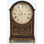 A brass mounted mahogany eight day bracket clock, second quarter 19th century, the arched moulded...