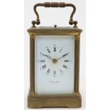 A French brass repeating carriage clock, late 19th / early 20th century, the brass corniche case ...