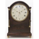 A mahogany eight day bracket clock, early 19th century, the break arch moulded cornice above stop...