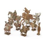A group of early Chinese pottery, Tang dynasty, comprising: a large polo player, 43cm long; a war...