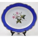 A large Chamberlain's Worcester platter, early 19th century, unmarked, of shaped oval form, the b...