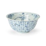 A Chinese blue and white bowl, Ming Dynasty, Chenghua period, rising from a short tapered foot to...