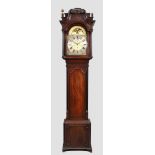 A George III mahogany musical longcase clock, with swan neck pediment above scrolling fretwork fr...