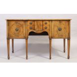 An English mahogany and line inlaid serpentine front sideboard, George III style, first quarter 2...