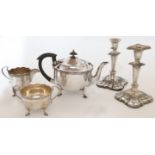 A silver three-piece tea set, Sheffield, 1931-32, Roberts & Dore Ltd., with wavy rims, on pad fee...