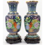 A pair of large Chinese cloisonné enamel vases, 20th century, each of baluster form, raised on sp...