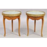 A pair of French inlaid walnut occasional tables, Louis XV style, 20th century, gilt metal mounte...
