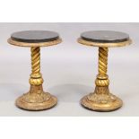 A pair of gilt wood and compositional occasional tables, second quarter 20th century, with later ...