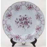A large Russian Popov porcelain charger, 19th century, decorated to the centre and border with bo...