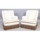 A pair of armchairs, late 20th century, in the manner of Howard and Sons, striped cream fabric up...