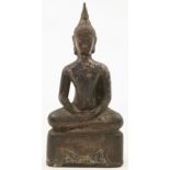 A Burmese bronze figure of a buddha, 20th century, modelled with a serene smiling face, closed ey...