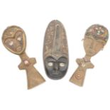 Two Ashanti carved hardwood fertility figures, 20th century, each with beadwork decoration to the...