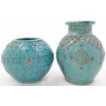 Two earthenware Fez vases, 20th century, both with impressed decoration, and similar green oxidis...