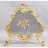 A French gilt metal fire screen, Rococo style, first quarter 20th century, 73cm x 69cm