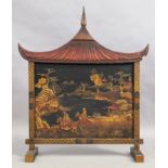 An English Japanned fire screen, first quarter 20th century, with pagoda pediment, 98cm high, 84c...