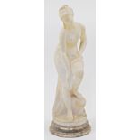 After Christophe-Gabriel Allegrain, French, 1710-1795, an alabaster figure of Venus bathing, atop...