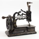 A Charles Raymond chain-stitch sewing machine, c.1871, with "walking pressure foot" and improved ...