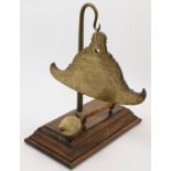 A Chinese bronze gong with beater, late 19th century / early 20th century, the gong of a flattene...