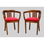 A pair of bentwood tub chairs, 20th century, with red velour upholstered seats (2)