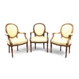 WITHDRAWN A set of three French mahogany fauteuils, in the Louis XVI style , third quarter 19th ce